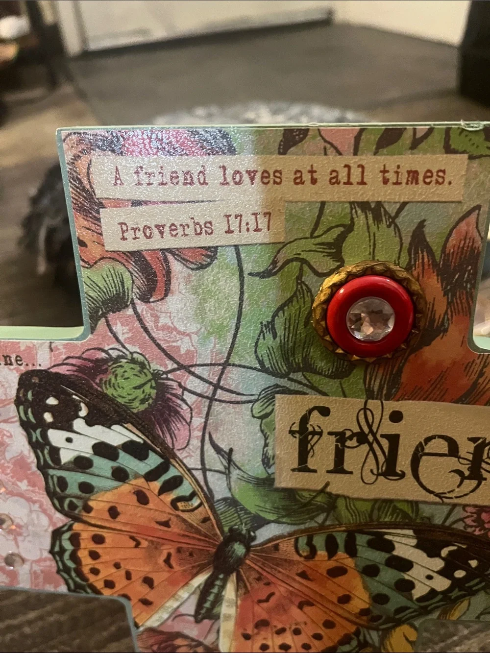 This is a wooden stand up cross with Biblical Verses about love of friends.